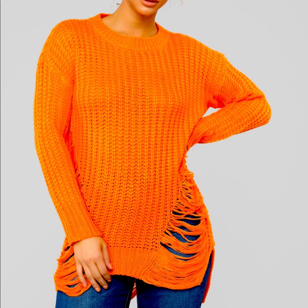 Orange sweater with frayed sides